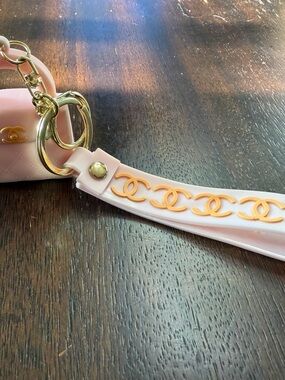 CHANEL Light Pink Silicone CC-Link Wristlet Key Holder with Gold Hardware(used)